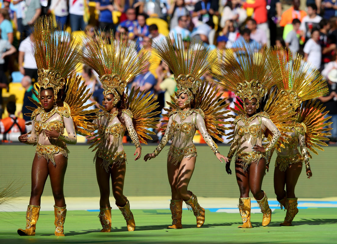 Ecuador and Switzerland soccer fans arrive at the National stadium to watch their teams play each other in a 2014 World Cup match in Brasilia